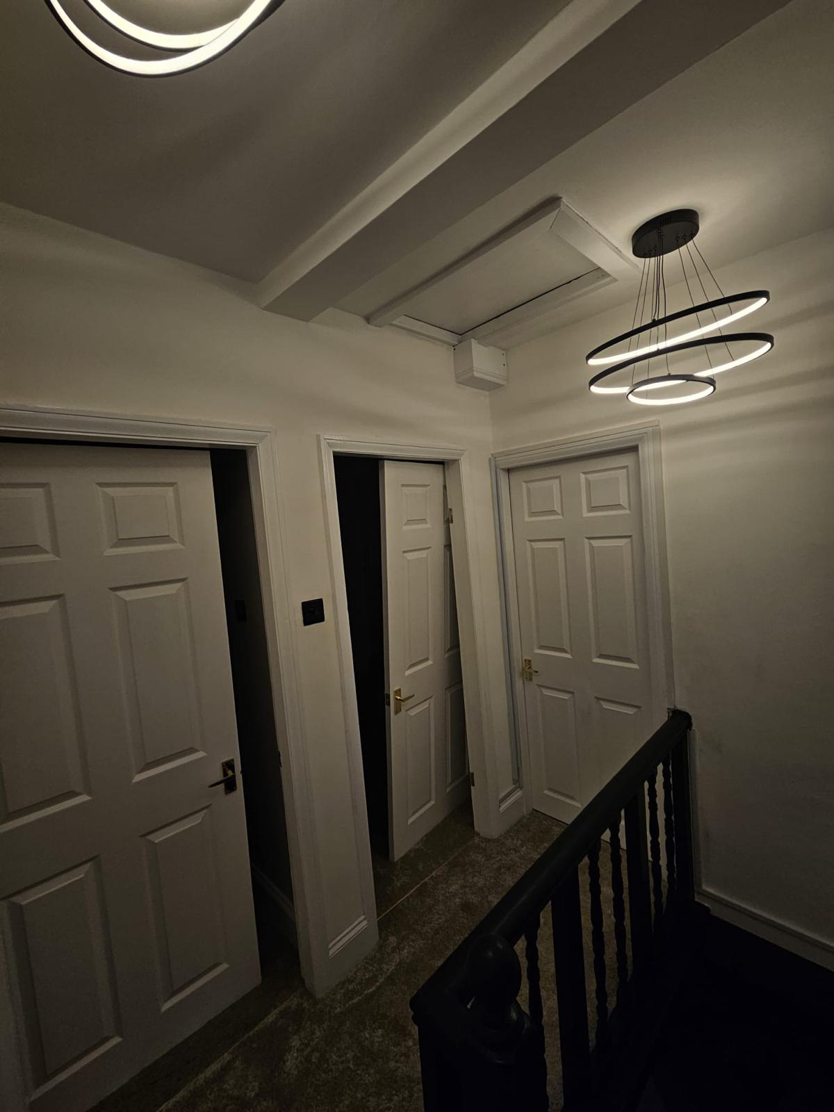 Completed hallway with modern lighting